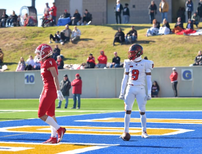 Del City's LaDainian Fields (right) reacts after scoring a touchdown during the Eagles' Class 5A semifinal win against Claremore on Nov. 24, 2023.